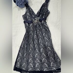 Elegant Navy Lace Dress with Embellished Waist